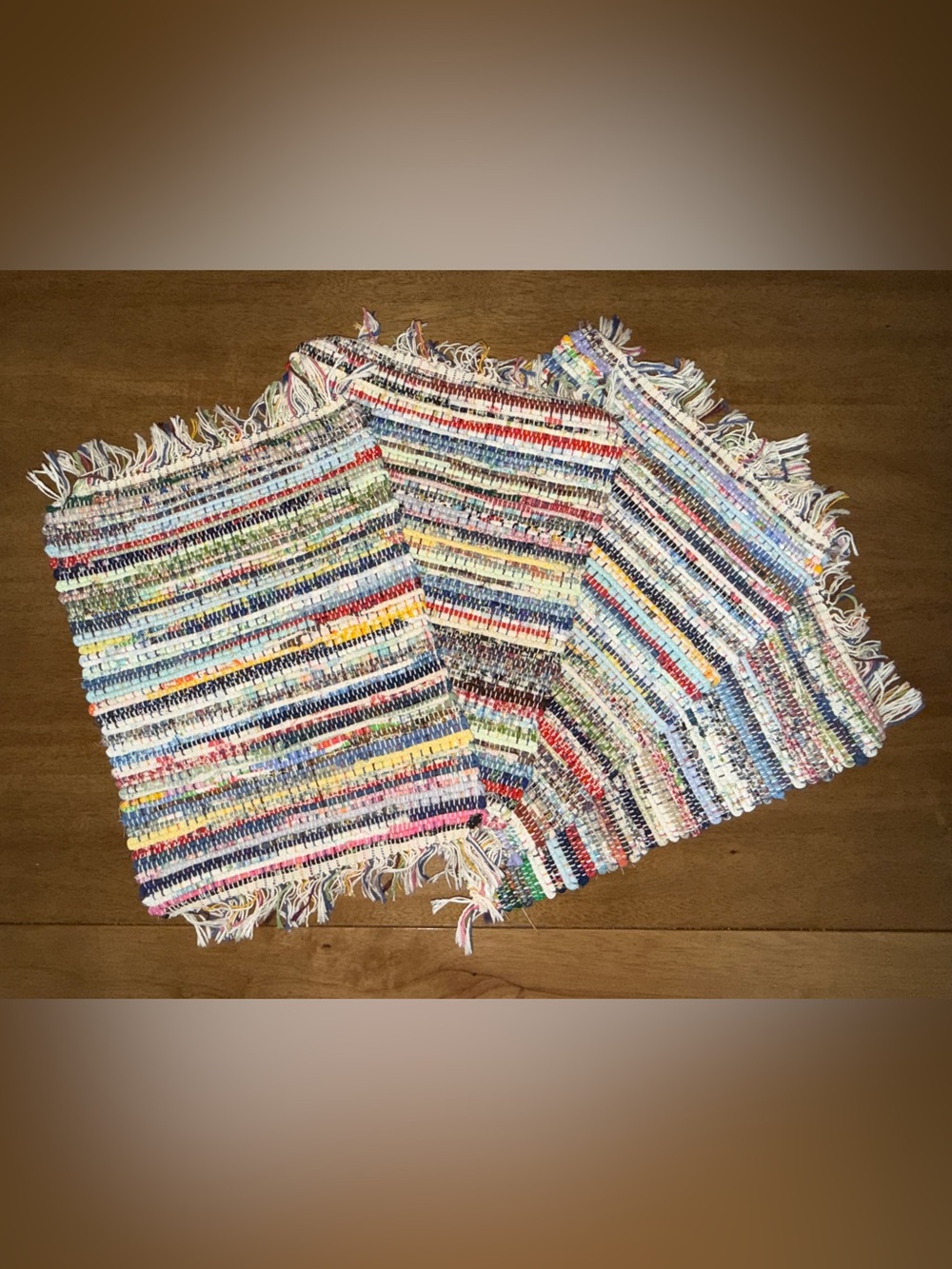 Set of 4 Multicolor Woven Placemats with fringe edges. One Size.
